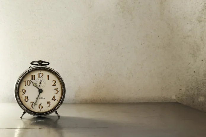 long-term effects of taking valproate - Vintage clock in a sunset lighting